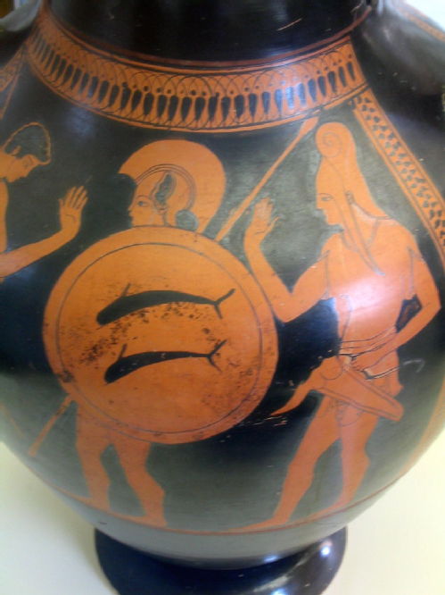 greek vase depicting hoplite warrior with dolphin shield