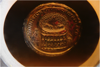 coin showing colosseum