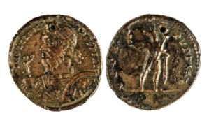 token showing emperor and anubis