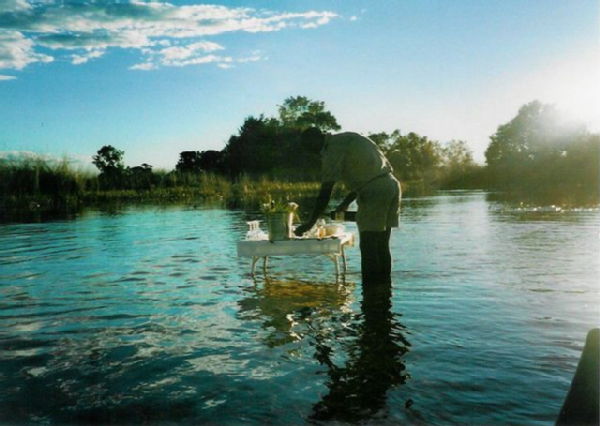 Preparing to serve champagne in the Okavango