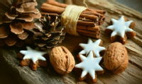 Christmas cookies, cinnamon sticks and pinecones
